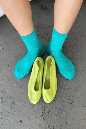 Her Socks in Turquoise