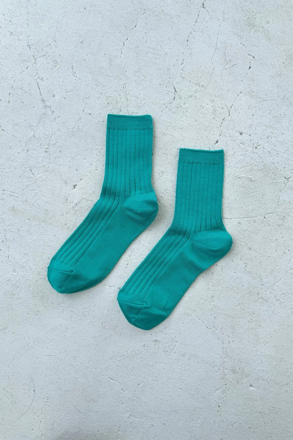 Her Socks in Turquoise